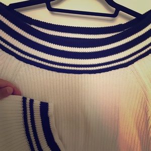 blue striped oversized sweater.